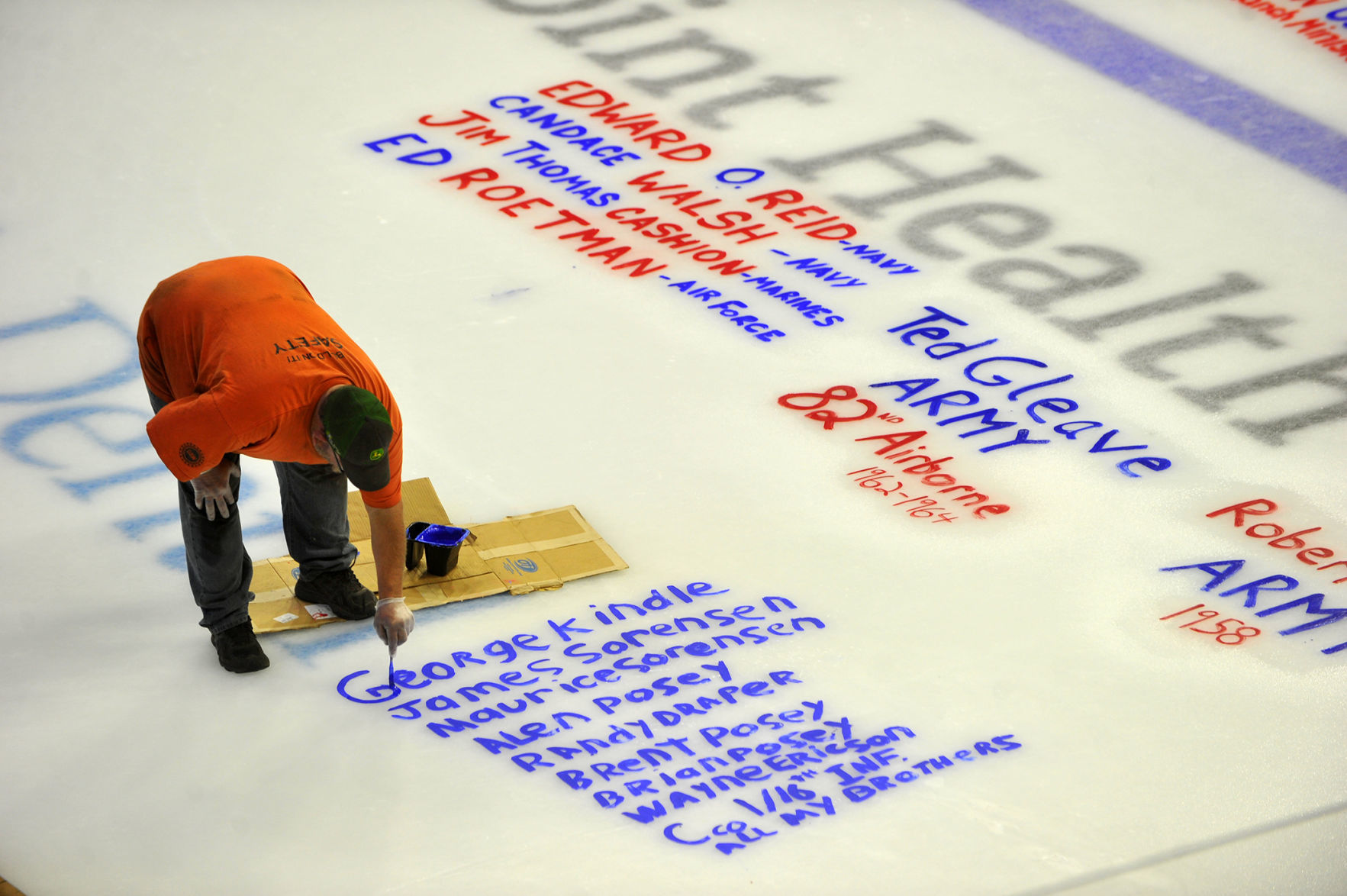 Salute To Military ice painting at the TaxSlayer Center